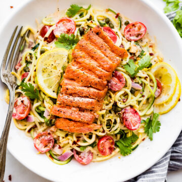 overhead image: Cajun smoked salmon on top of healthy spring salad