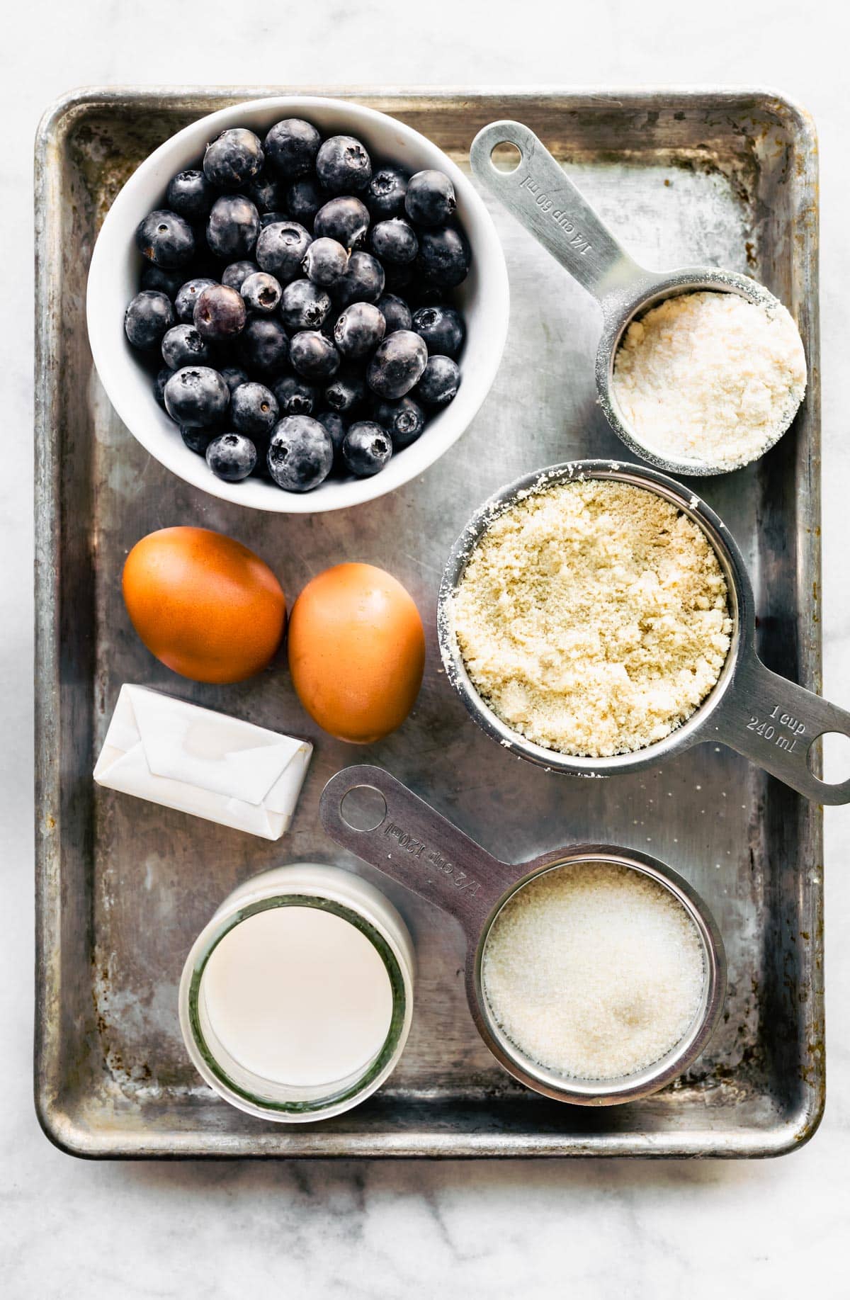 Ingredients needed to make almond flour blueberry buckle coffee cake.