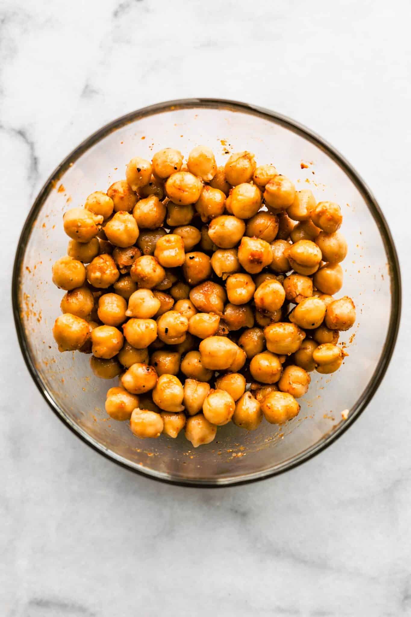 seasoned chickpeas in a clear bowl