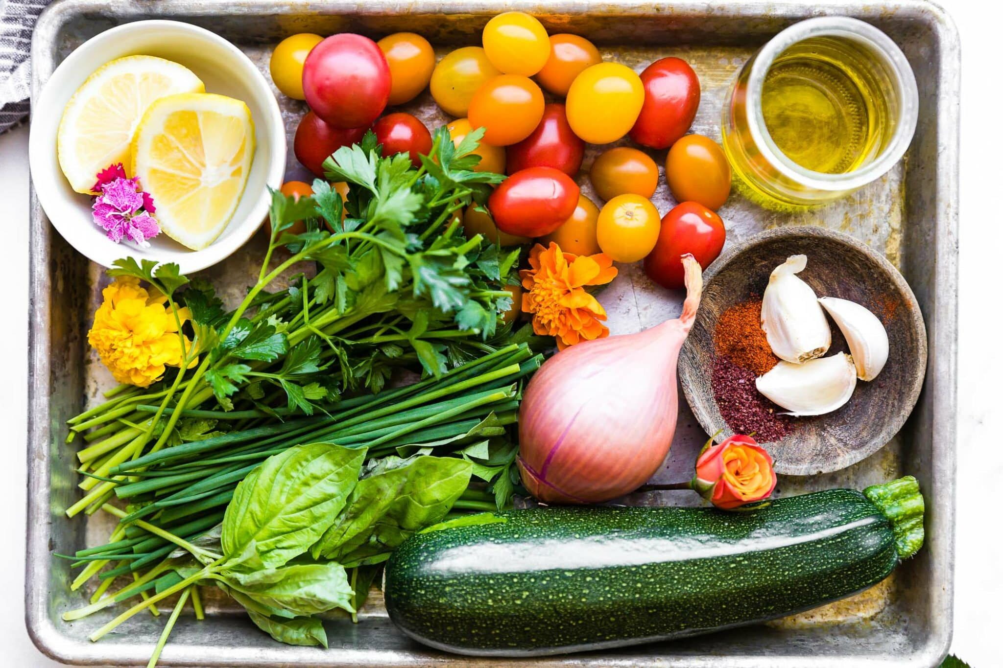 Ingredients for three herb tomato zucchini salad.