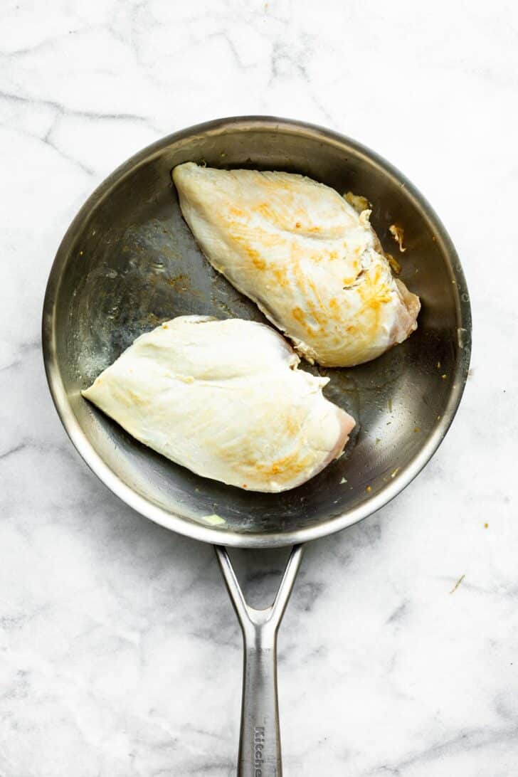 seared chicken in a pan