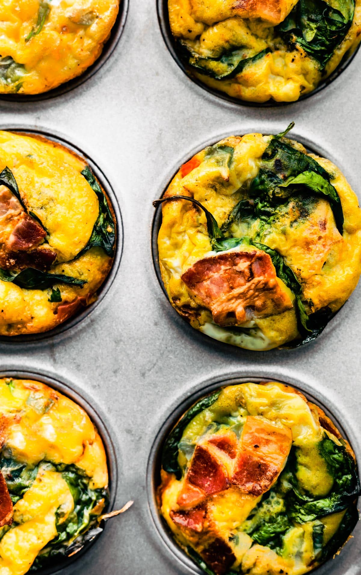 Close up of Frittata Muffins in muffin pan.