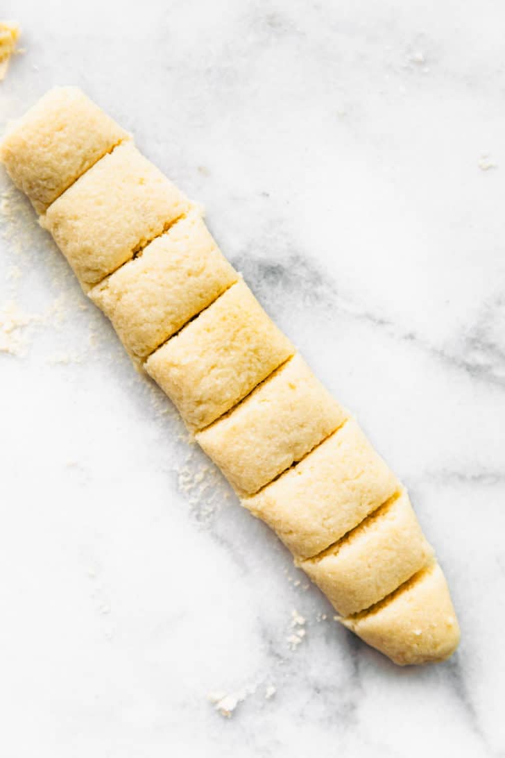 Log of dough sectioned before cutting into pieces.