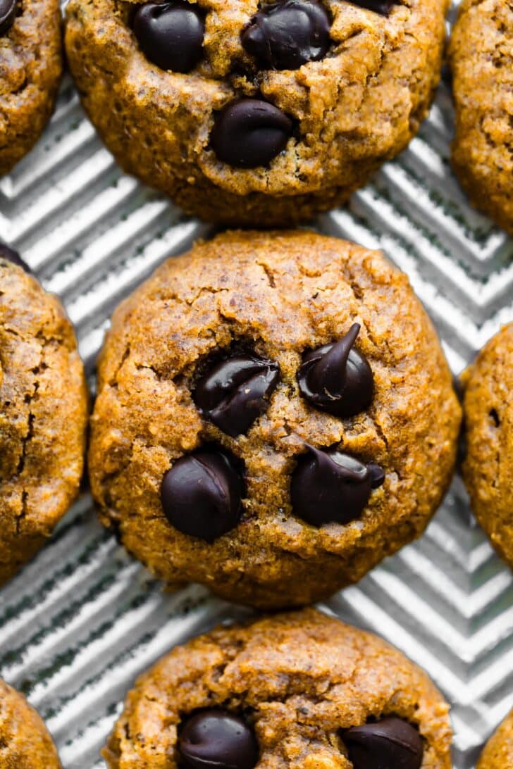 Overhead Close-up of pumpkin chocolate chip cookies on a baking sheet