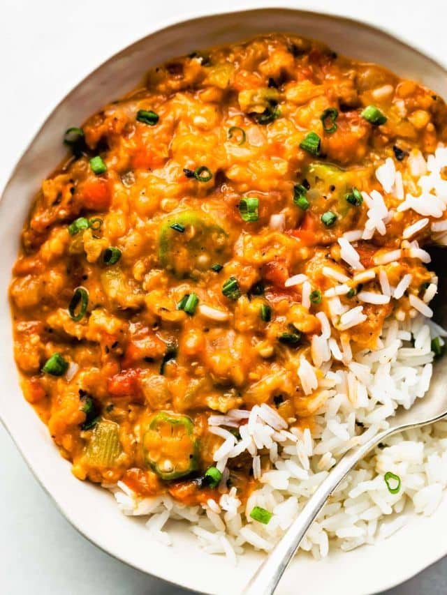Overhead view Instant Pot Gumbo served in white bowl with side of white rice