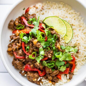Gluten free Asian beef bulgogi dinner with white rice on a white plate.