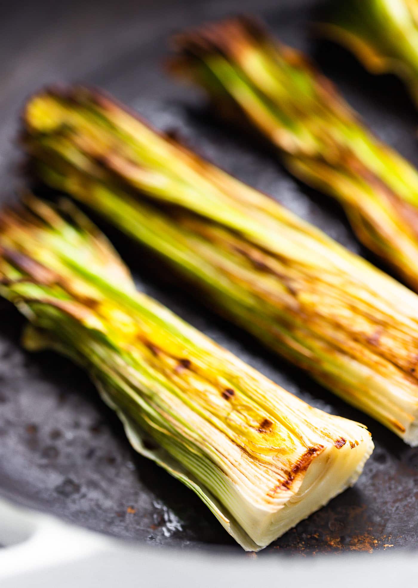 close up image of roasted leeks