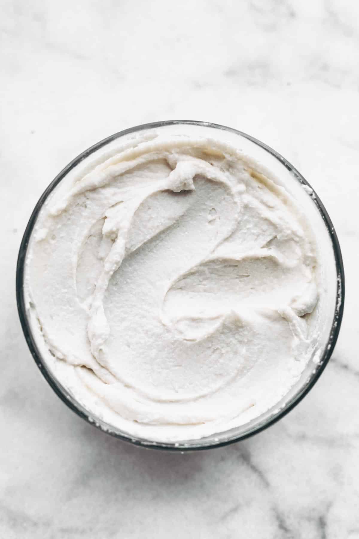 white coconut cream frosting in a bowl