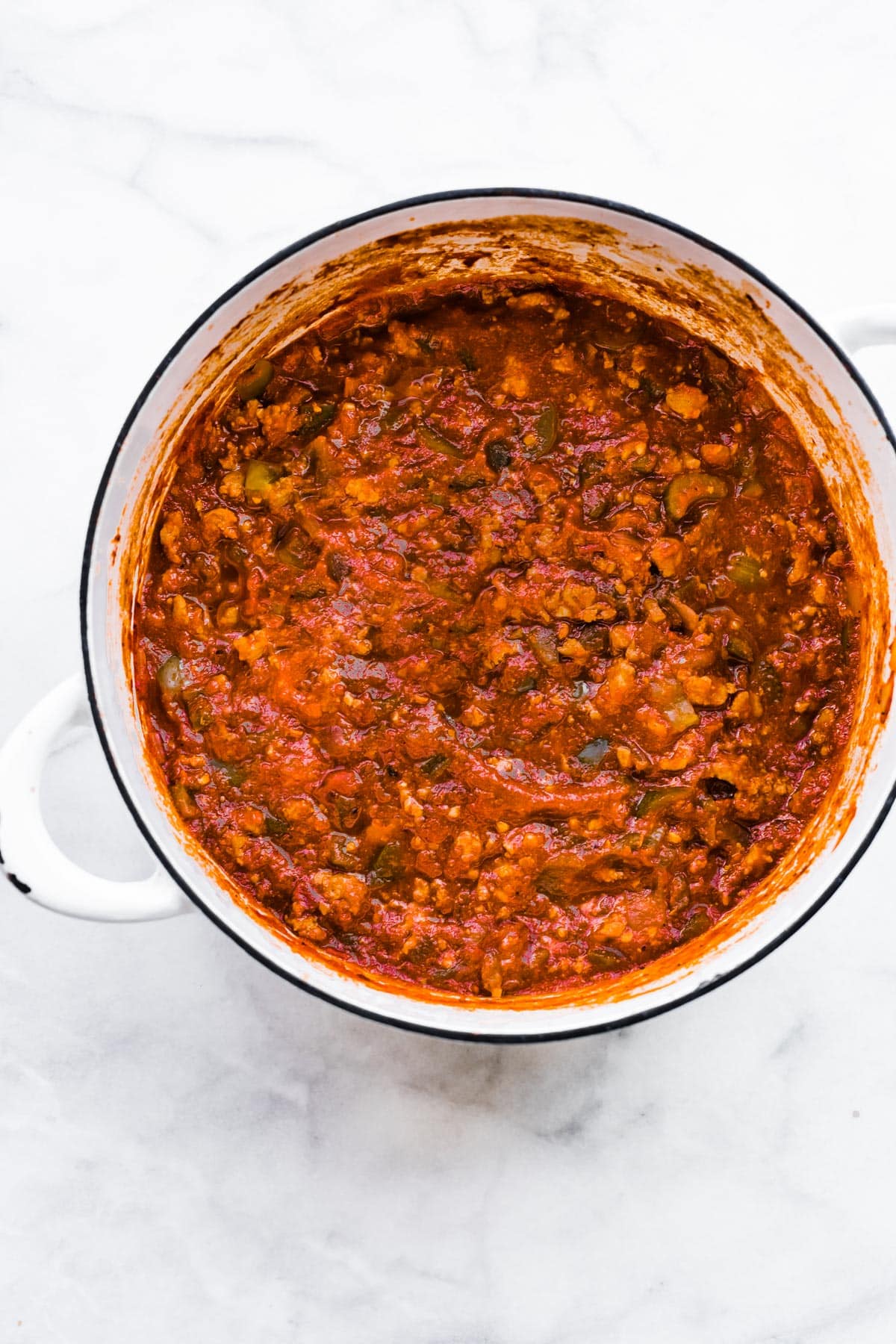 Overhead photo of gluten free no bean chili in a white soup pot.