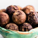A bowl of chocolate nut-free protein balls.