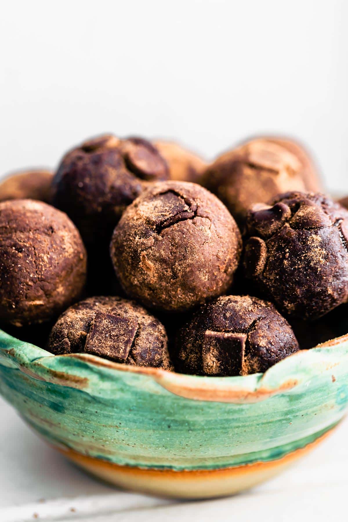 A bowl of chocolate nut-free protein balls.