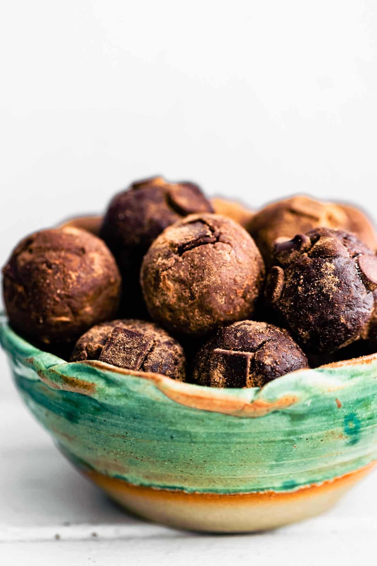 A bowl of chocolate nut-free protein balls.