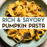Close-up of fork twirling creamy pumpkin pappardelle pasta with crispy bacon pieces and grated parmesan in a blue ceramic bowl with a text overlay for pinterest.