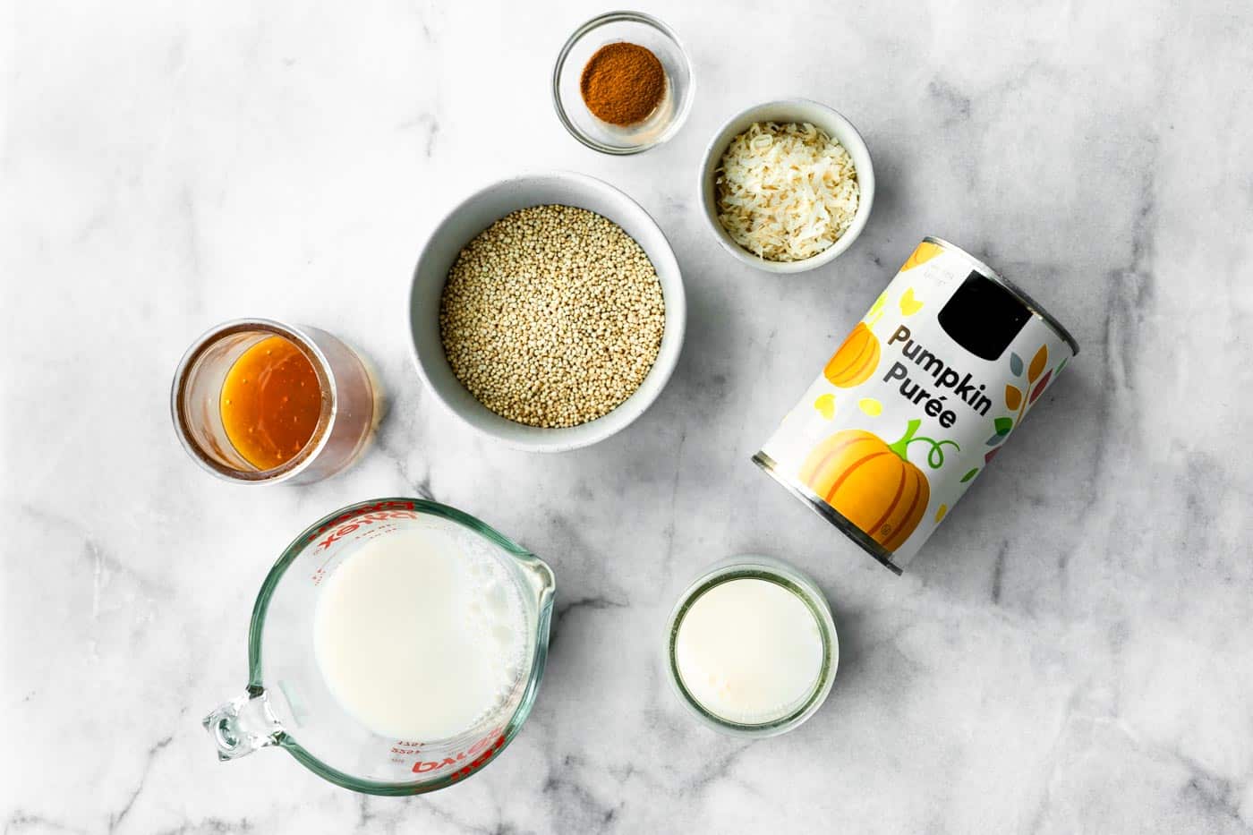ngredients for pumpkin quinoa porridge: pumpkin puree, quinoa, milk, coconut, spices