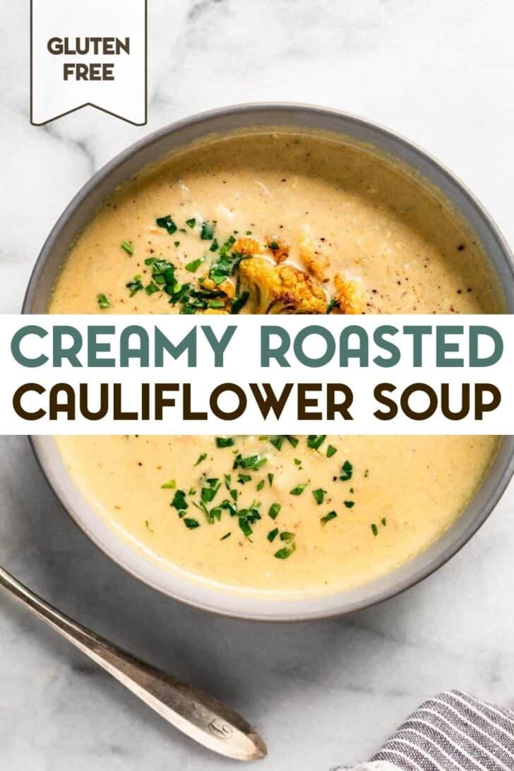 An overhead photo of a bowl of roasted cauliflower soup with a text overlay for pinterest.