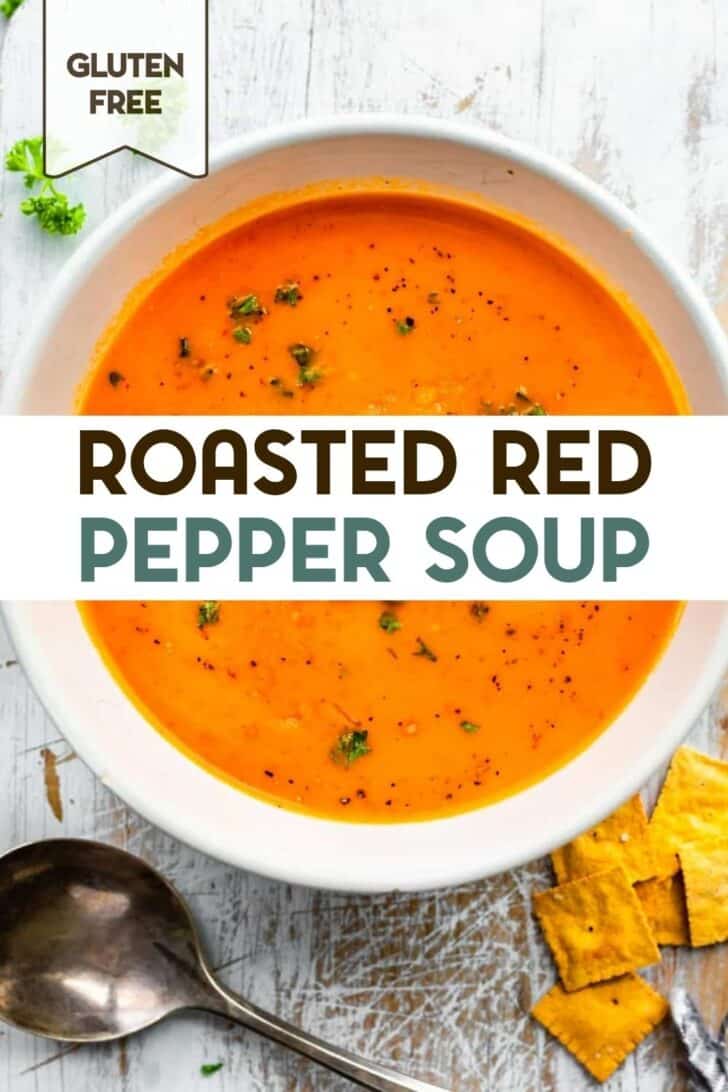 An overhead photo of a bowl of roasted red pepper soup with a text overlay for pinterest.
