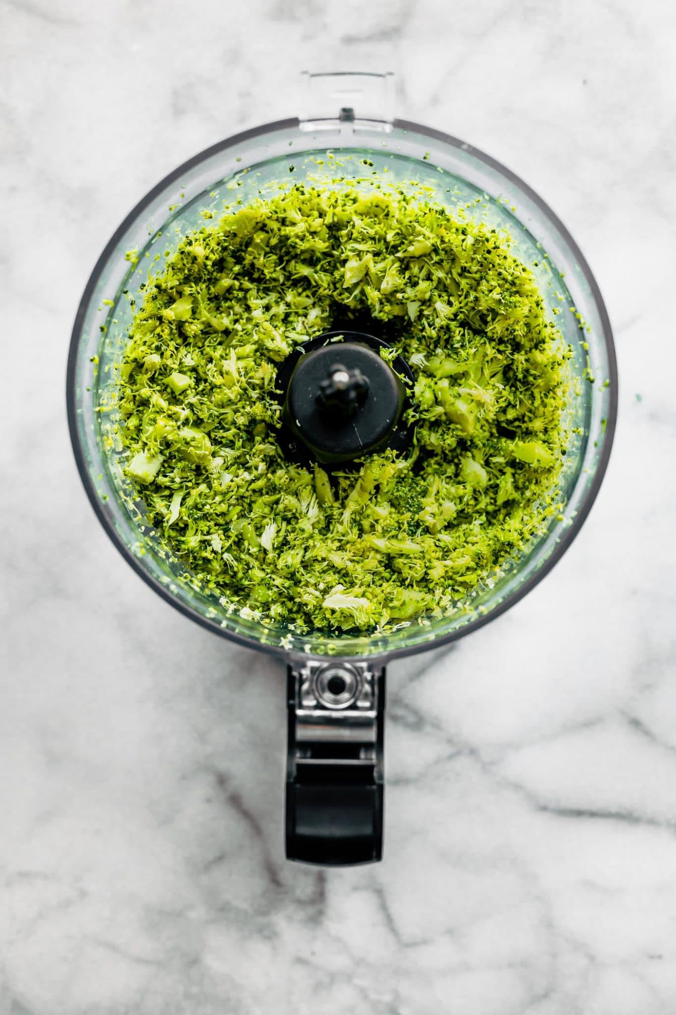 Diced broccoli in a food processor.