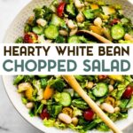 A photo of a large serving bowl of romaine chopped salad with white beans with a text overlay for pinterest.