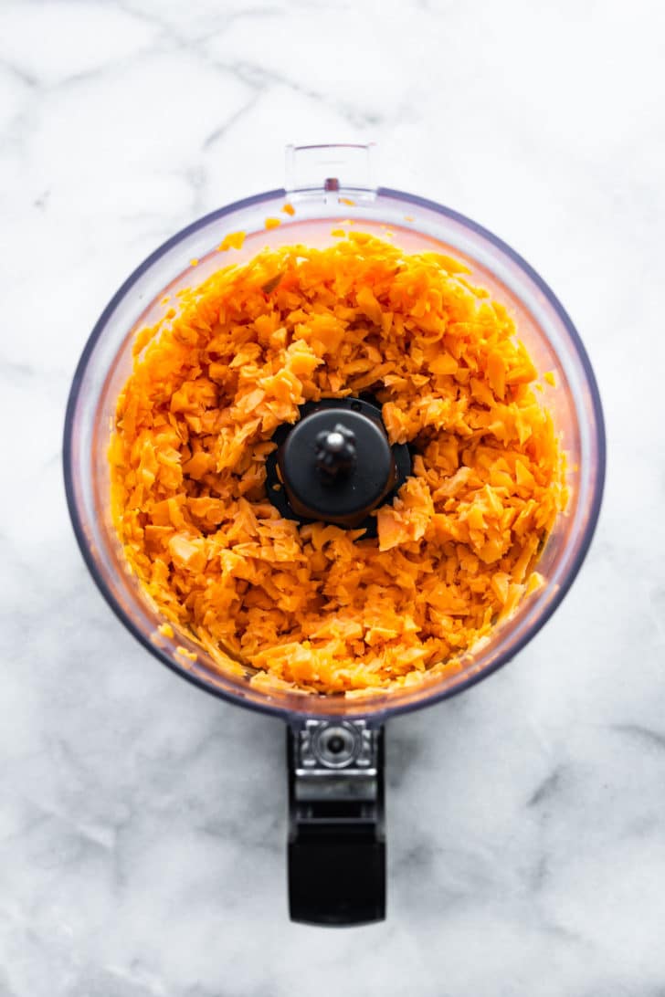 shredded sweet potato in a food processor