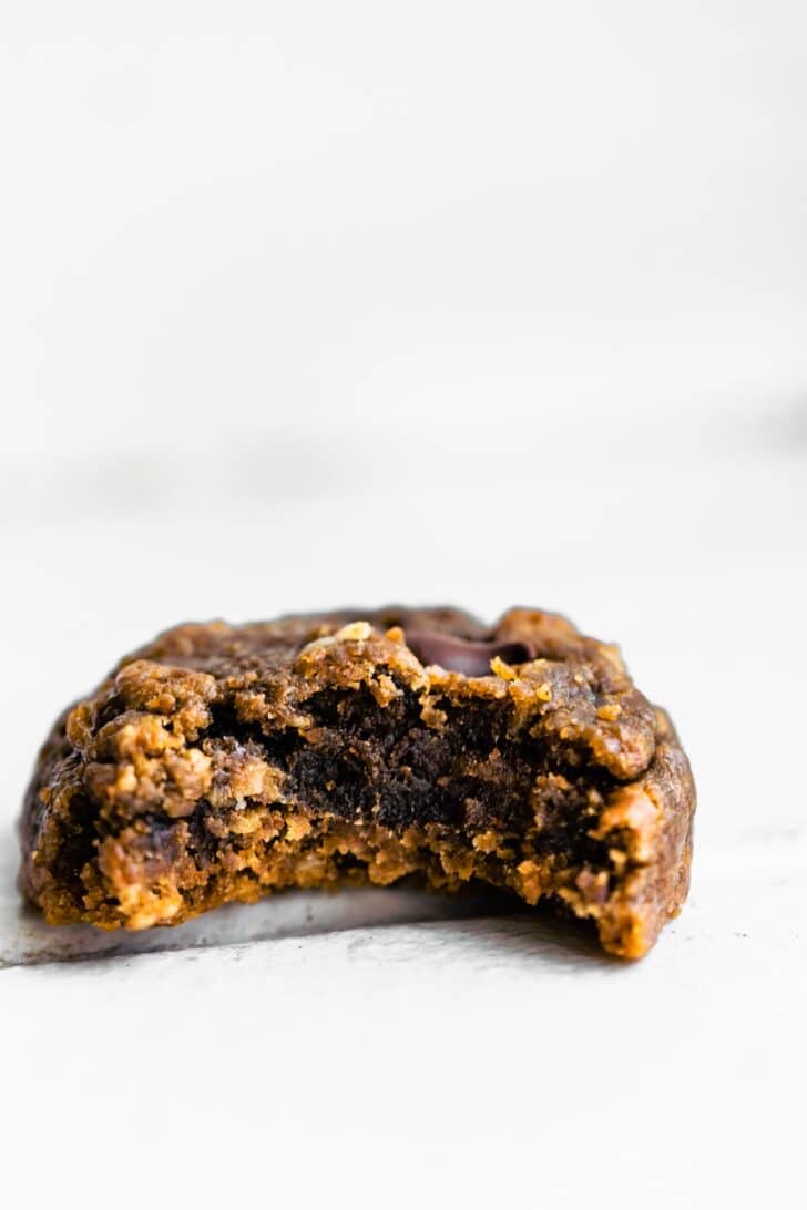 Up close photo of a bite taken out of an almond butter banana breakfast cookie.