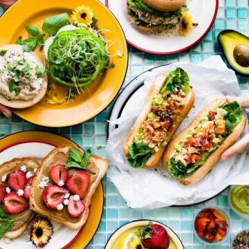 3 vegan sandwiches on colorful plates