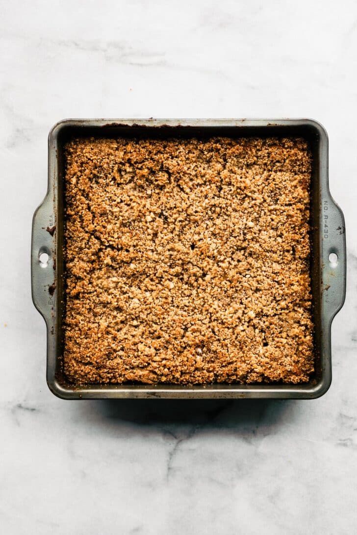 almond flour blueberry cake baked in a pan with crumble topping