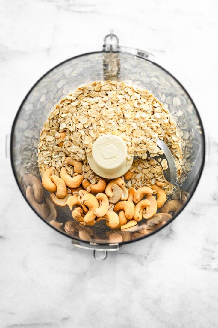 whole oats and cashews in a food processor