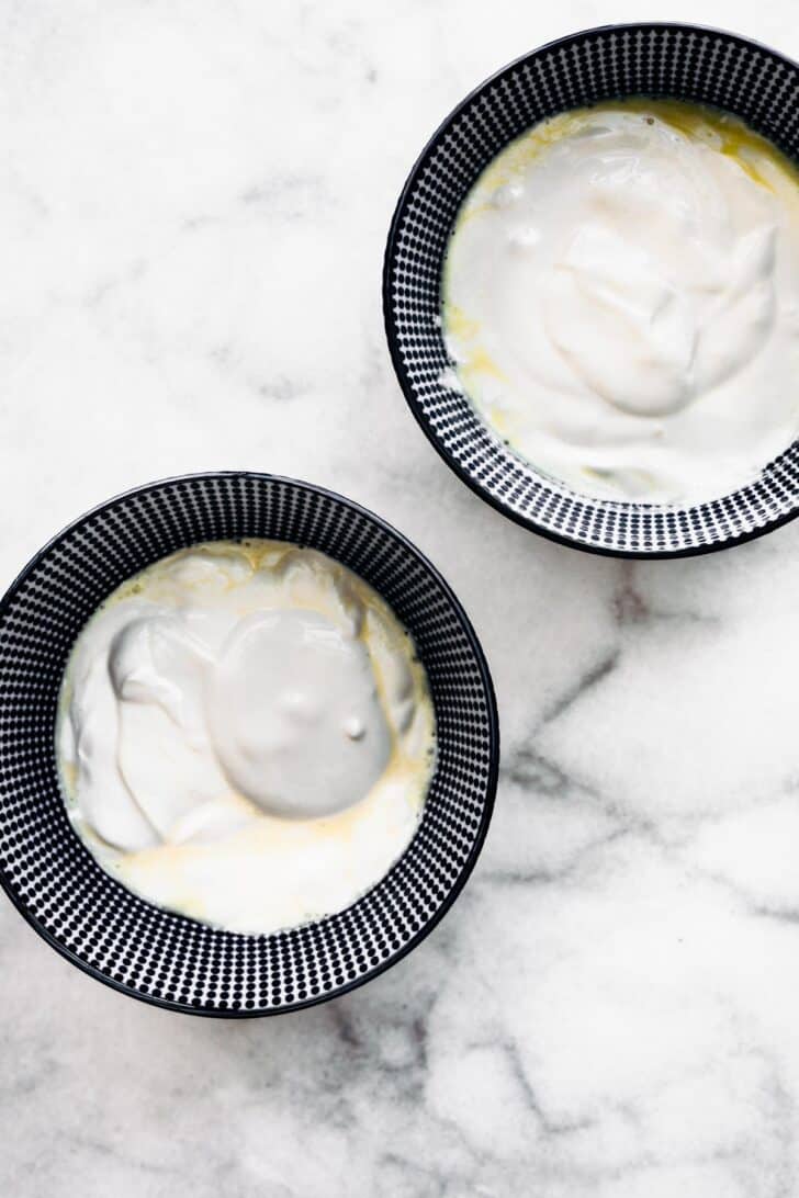 Two bowls of coconut milk yogurt.