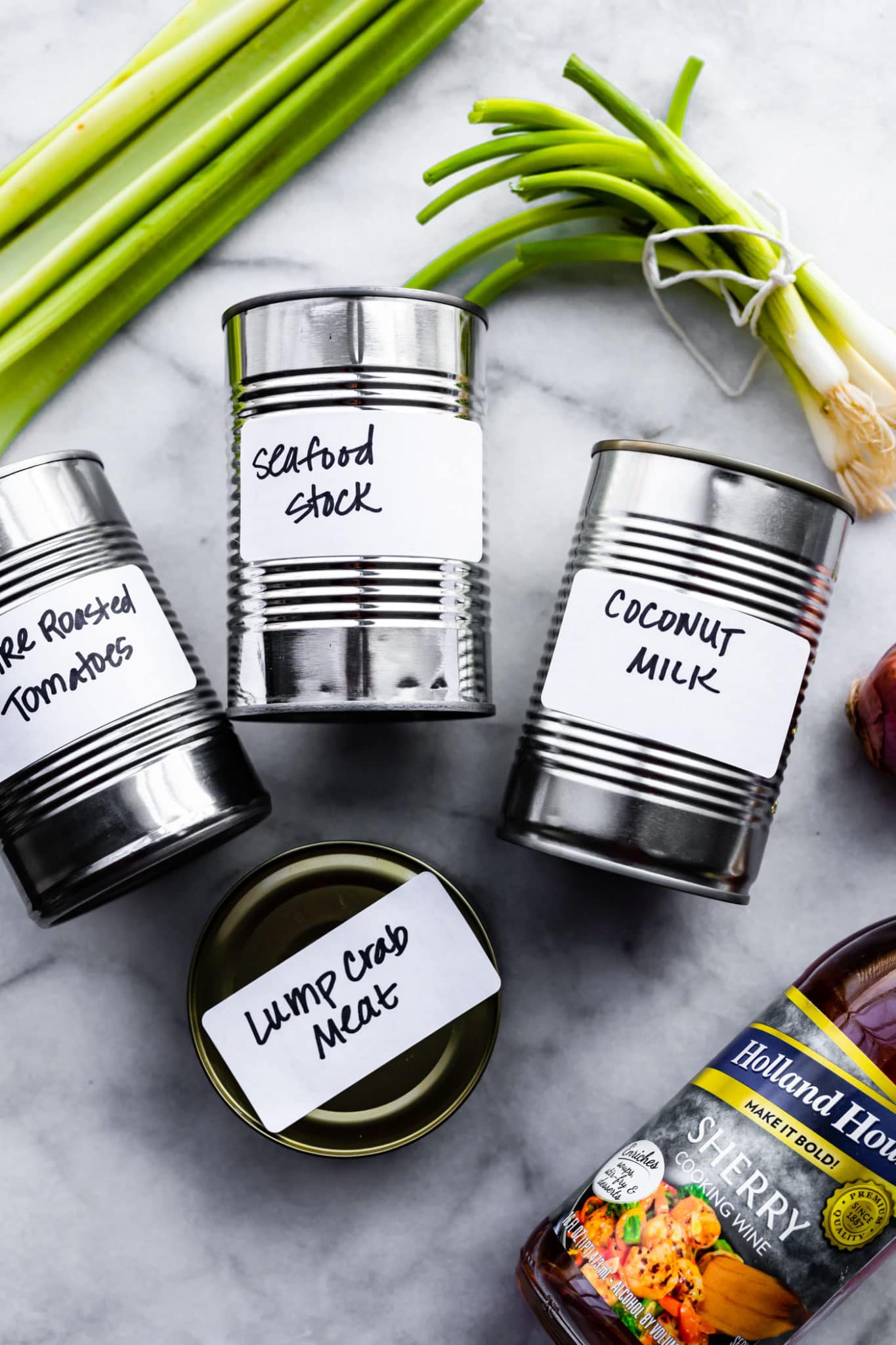 cans with ingredients for tomato crab bisque