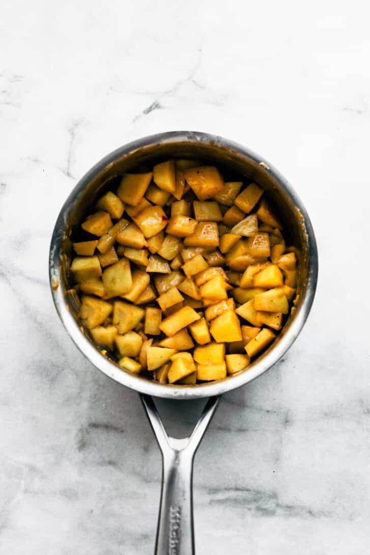 Diced apples with spices in a pan