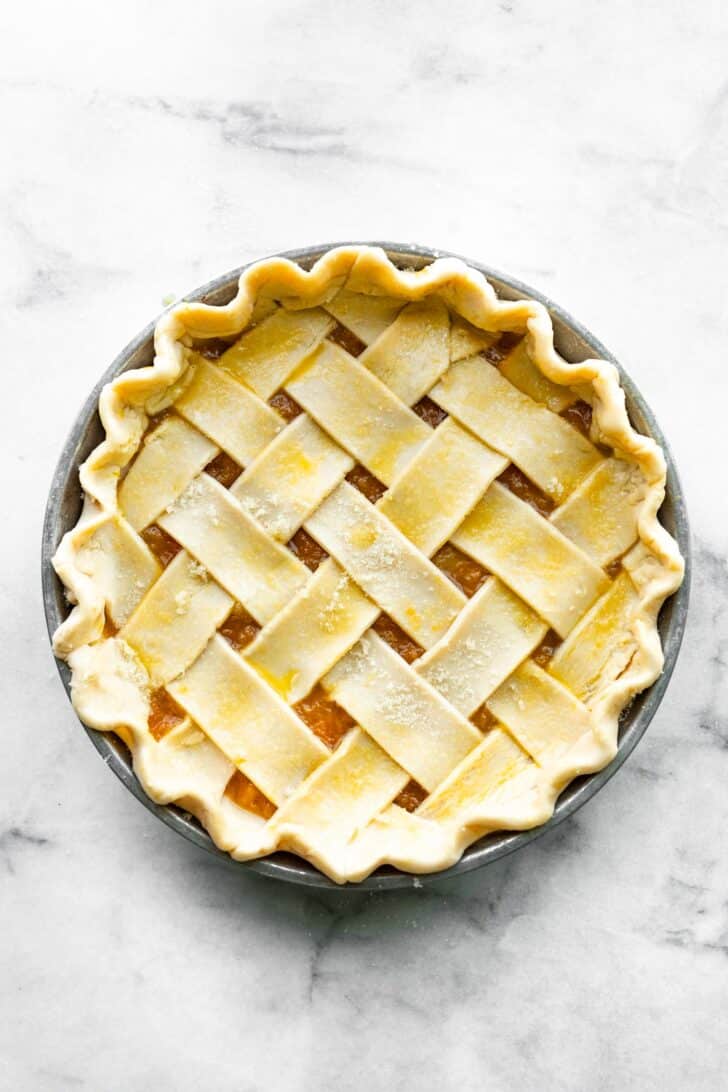 unbaked apricot pie with a lattice crust