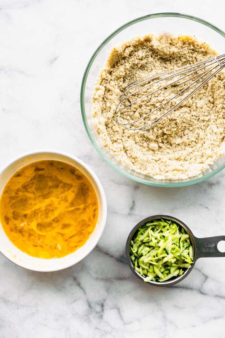 The wet and dry ingredients for lemon zucchini bread.