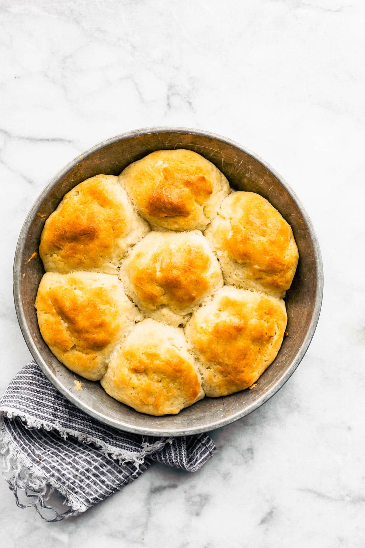 Browned Gluten Free Rolls in a pan.
