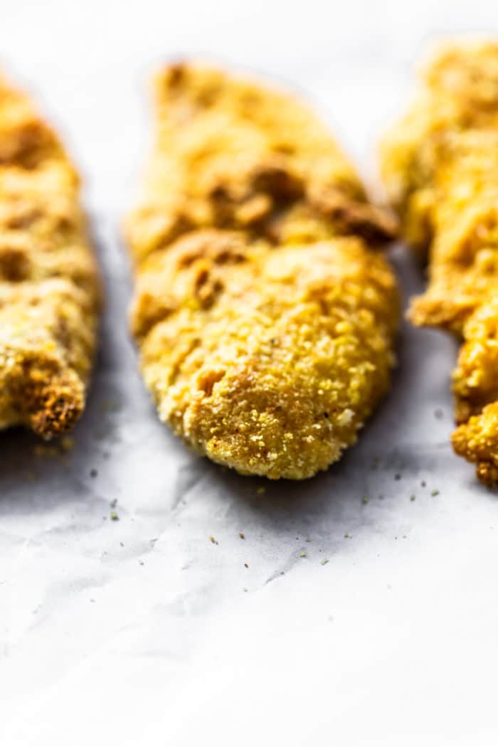 close up of crispy chicken fingers