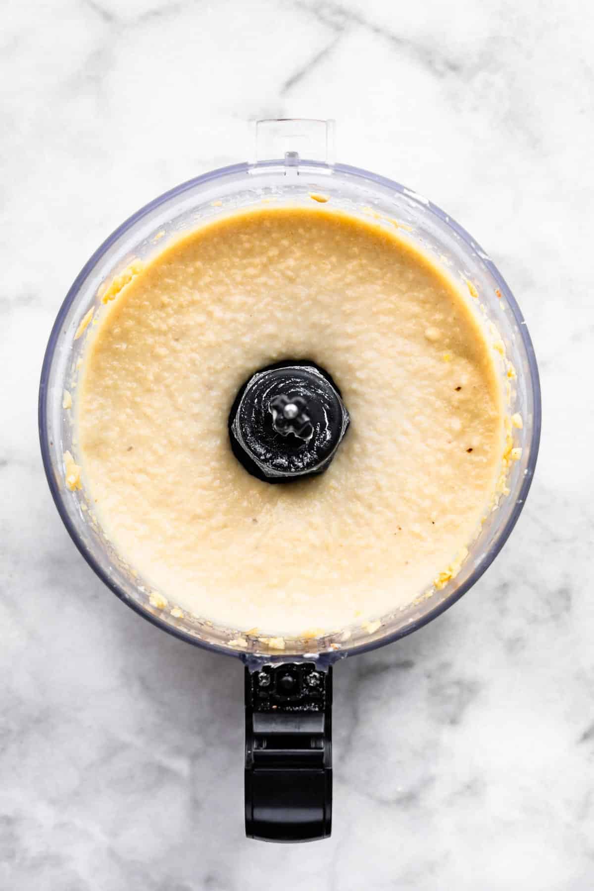 Filling ingredients being blended together in a food processor.