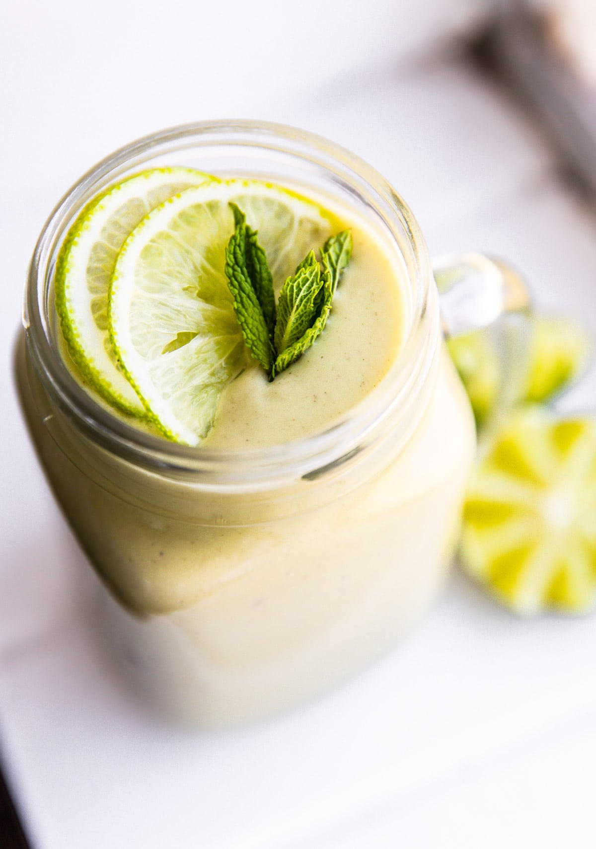 keto green smoothie with lime and mint in jar