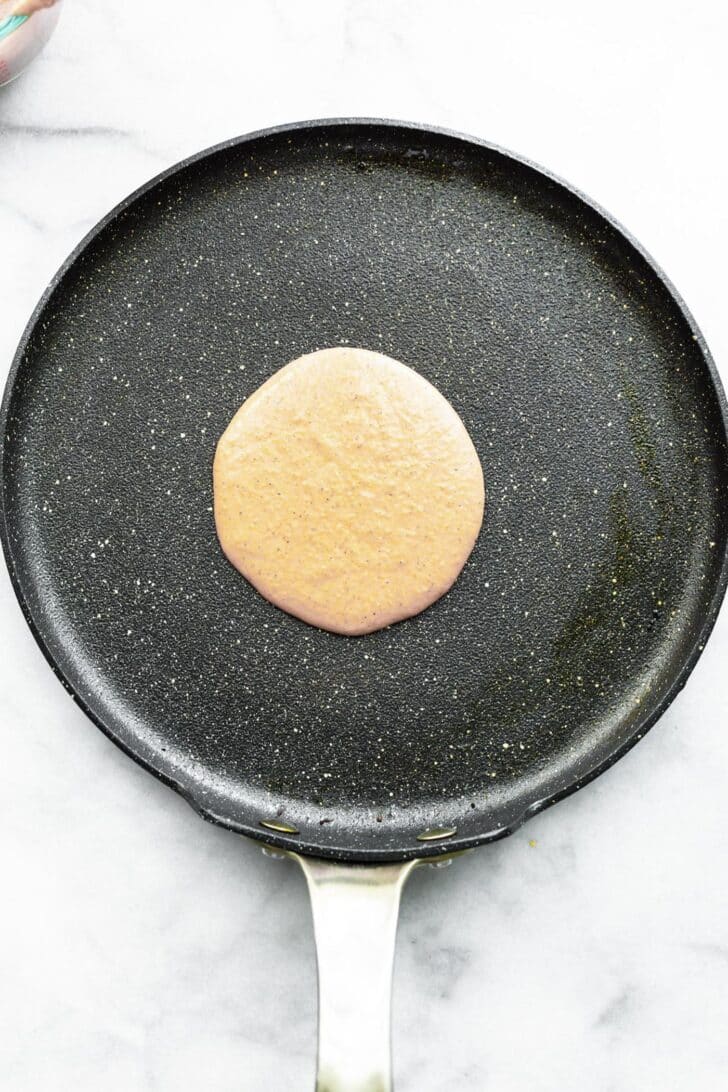 pancake batter on hot pan