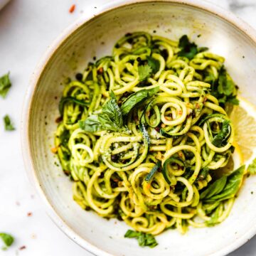 Overhead view roasted poblano pesto zucchini noodles.