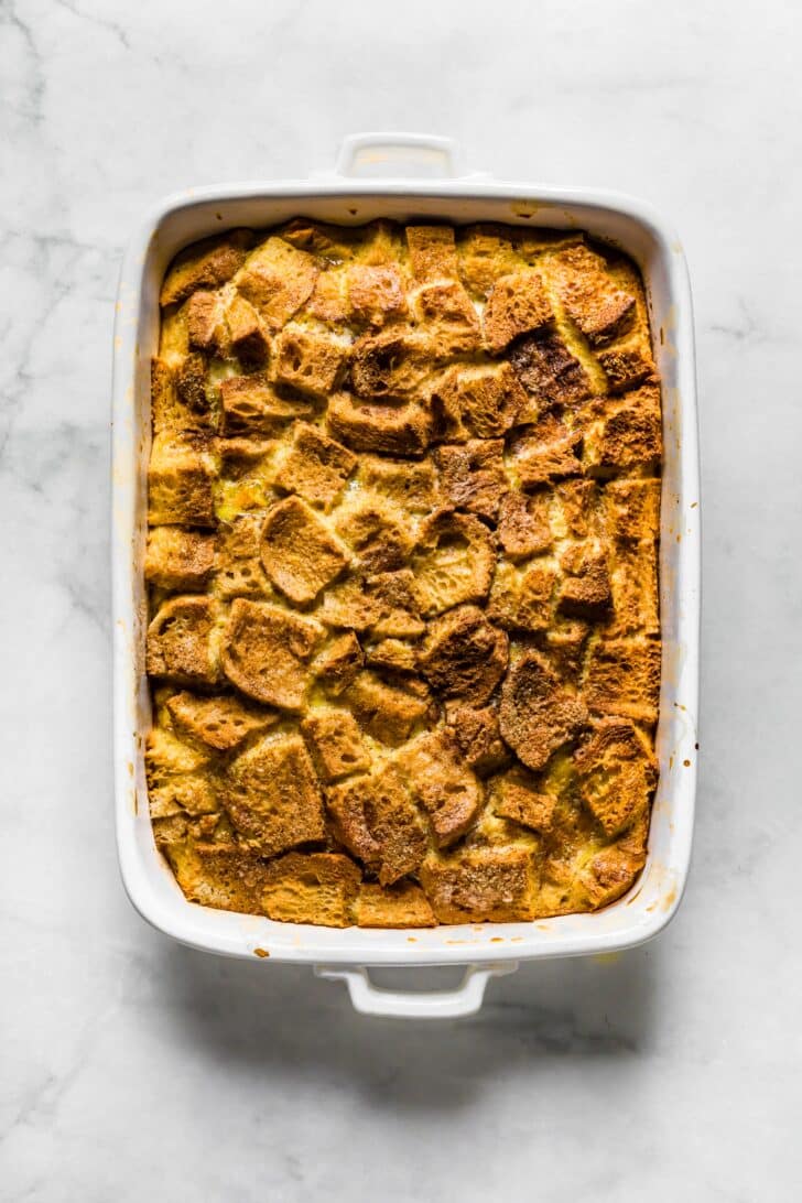 Cinnamon sugar mixture sprinkled on baked french toast casserole.