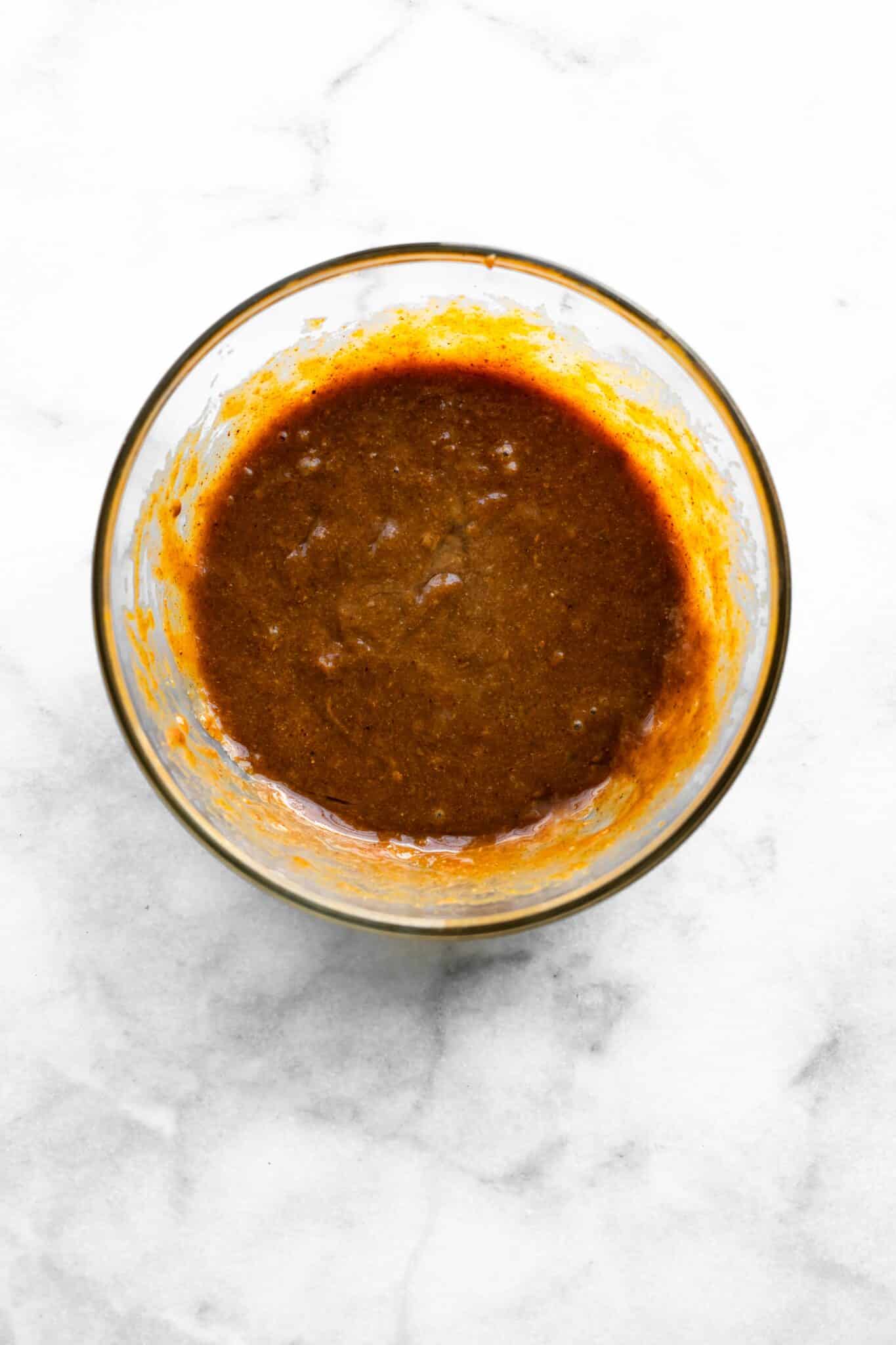 Wet ingredients combined for soft baked paleo bars.