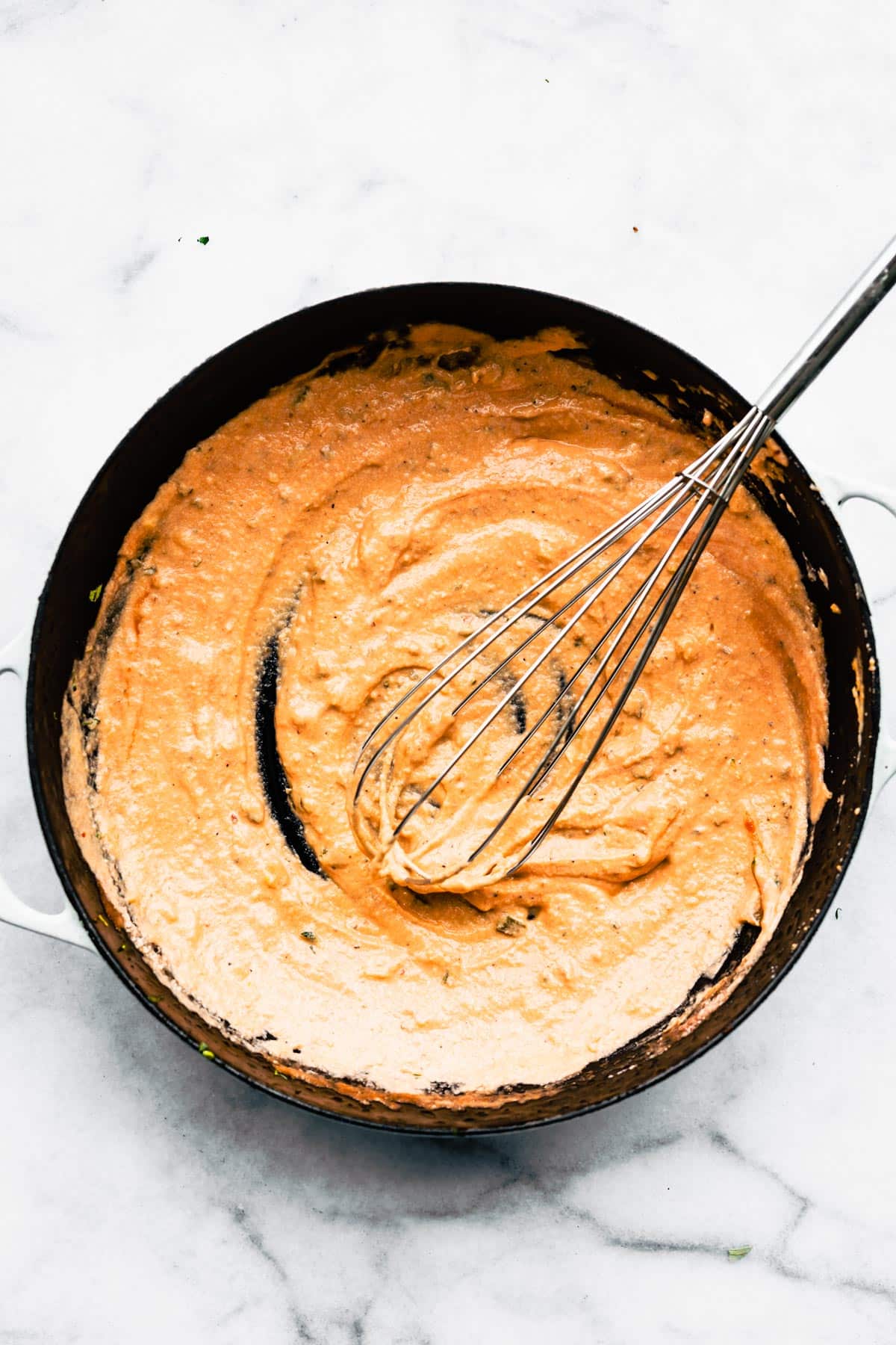 Whisk in a pan of creamy marinara sauce for spaghetti squash casserole.