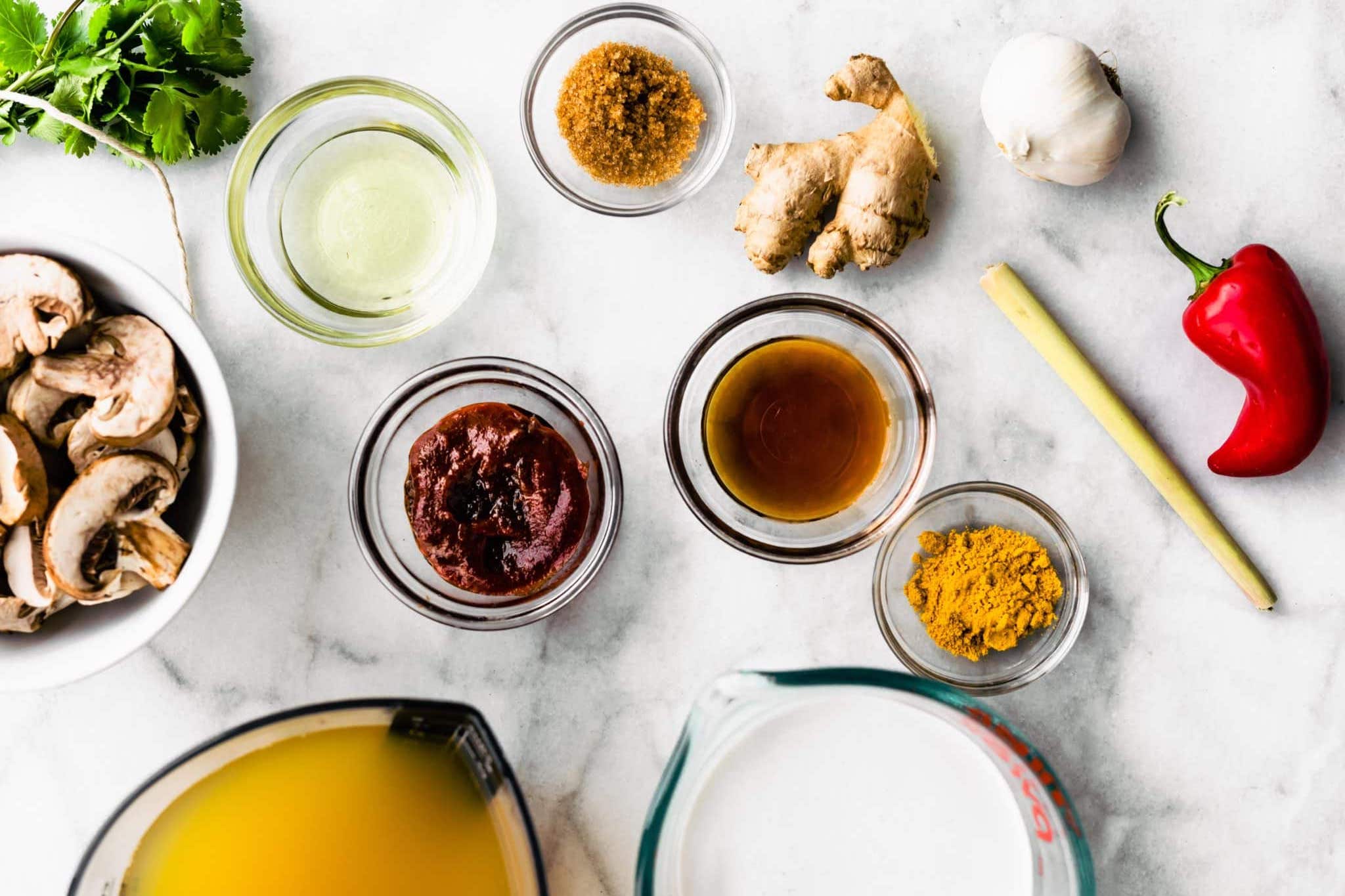 Overhead photos of ingredients in separate bowls like broth, chili paste, and mushrooms.