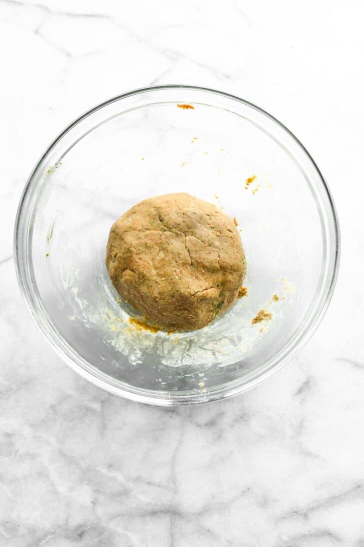 dough for protein bites in a clear bowl